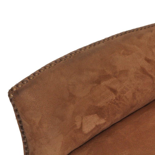 This pair of transitional suede armchairs effortlessly blends classic elegance with modern comfort. Upholstered in a rich,...