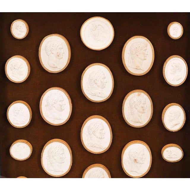 A fine and important Italian framed group of twenty-five gilt-tooled plaster Grand Tour Giovanni Liberotti intaglios...