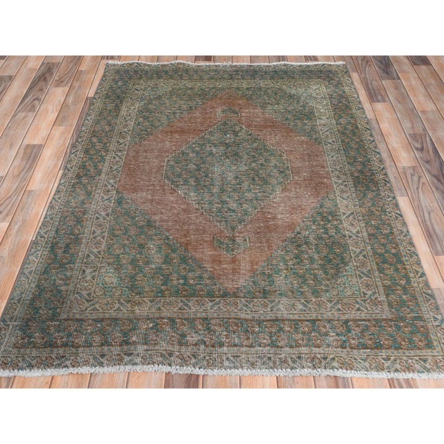 This is a genuine hand knotted oriental rug. It is not hand tufted or machine made rug. Our entire inventory is made of...