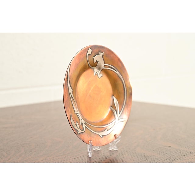 A gorgeous Arts & Crafts period sterling silver on bronze plate or catchall By Heintz Art Metal Shop USA, Early 20th...
