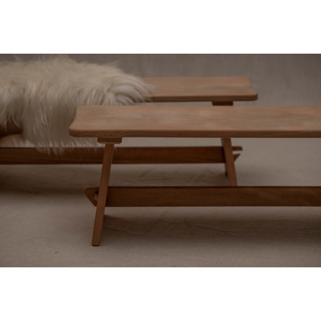Vintage set of two benches made out of solid wood. Honest and pure construction. Pure artisanal details in the joinery and...