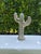 A striking vintage ceramic cactus sculpture featuring a softly modeled, sculptural silhouette and richly textured desert-...