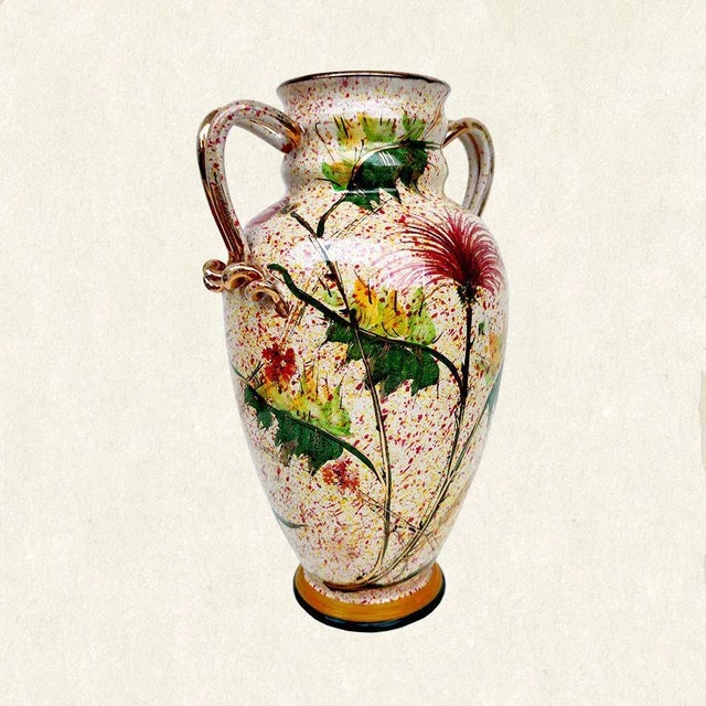 Giulio Pagliarini | large polycormal terracotta vase with "Flowers and Leaves" decoration two golden handles | h.cm....