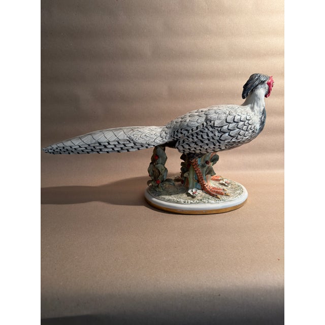 A very finely hand painted pheasant hen at about life-size scale by Mottahadeh. Likely produced 1970-1980. Clever use of...