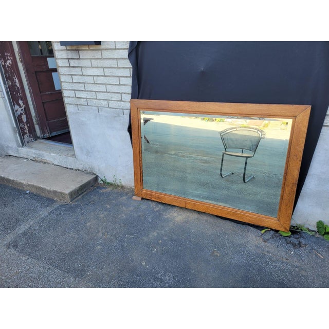 This Arts and crafts oak large mirror is a stunning piece with a rectangular shape and a brown color. The frame finish is...