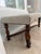 Traditional English Carved Oak Bench with a tufted beige suede seat and Brass Nailhead Trim.