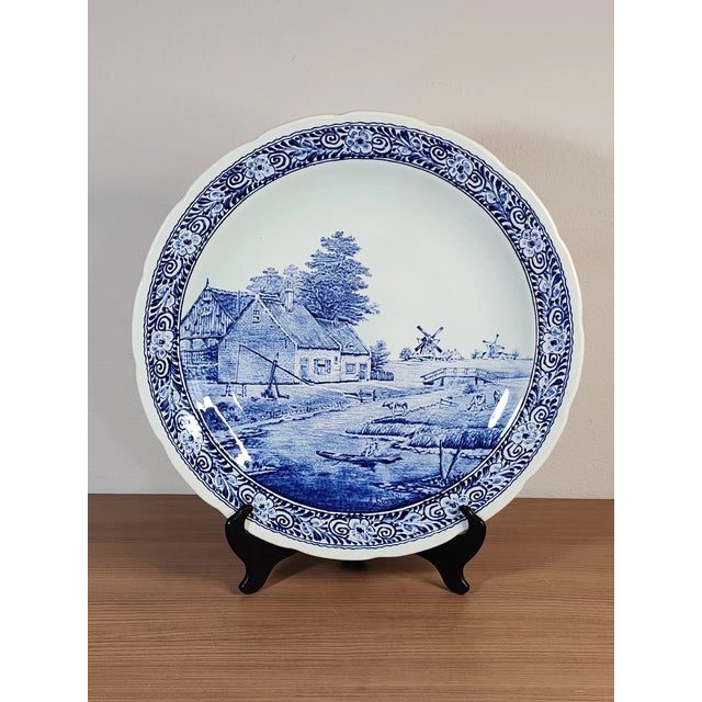 Bring classic European charm to your table or wall display with this **Vintage Delfts Boch Belgium Blue Windmill Holland...