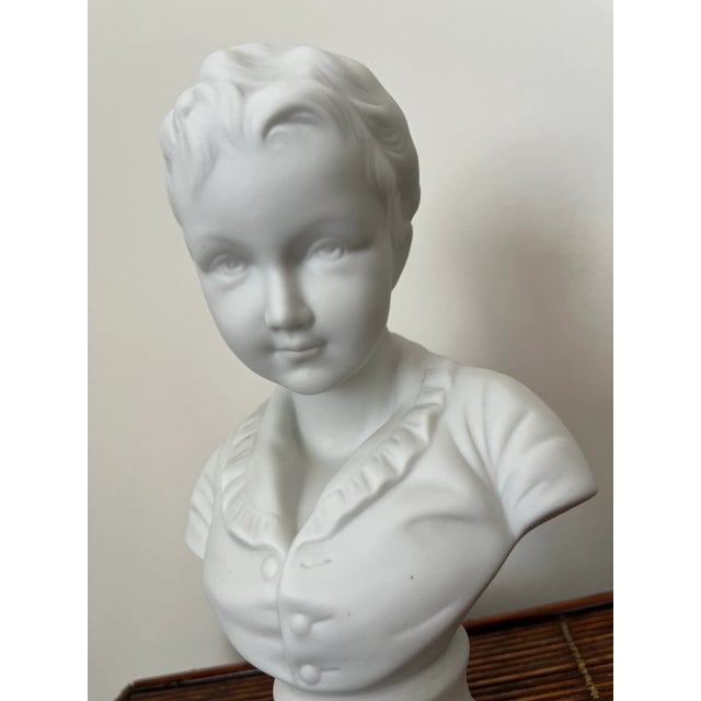 This is an adorable vintage bisque bust of a young child that has fine details making it look very realistic. Please look...