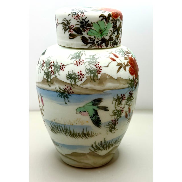 Standing at 7 inches tall, this jar is so pretty with its detailed artistry; featuring colorful birds amidst delicate...