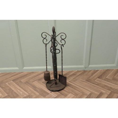 Round Wrought Iron Fireside Companion Tool Set This set hangs on its own stand, poker, shovel, tongs and brush made in...