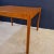 Scandinavian square coffee table. It is made of teak. This table is very practical, we placed it easily in its interior,...