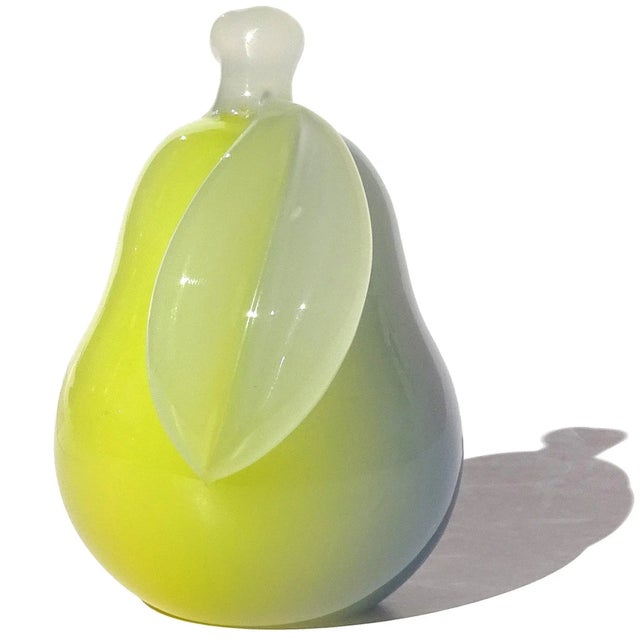 Beautiful vintage Murano hand blown yellow and blue opal Italian art glass decorative pear shaped paperweight. Documented...