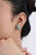 These stud earrings feature 4 carats of vibrant cushion-cut natural turquoise, set in 14k yellow gold. The center stones...