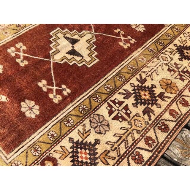 Each vintage rug is truly one of a kind, and this beautifully balanced Milas rug is no exception. Handwoven in...