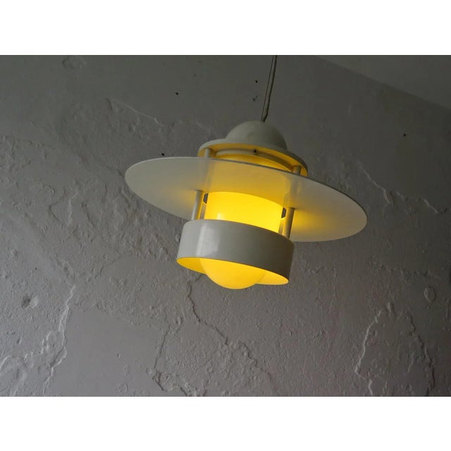 This bigger size is not in production anymore Meant for 3 bulbs This piece is attributed to the mentioned designer/maker....