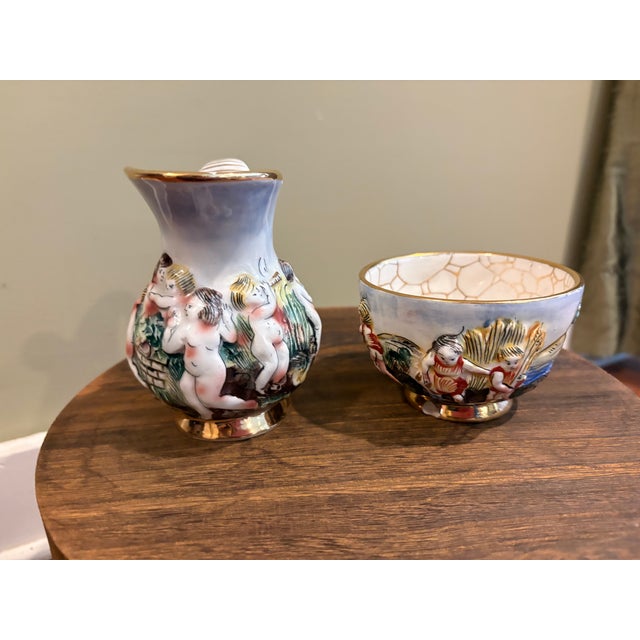 Add a touch of vintage Italian elegance to your home with this stunning, matching 2-piece Capodimonte porcelain...