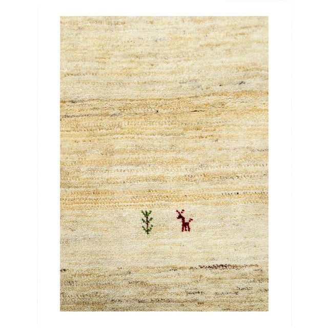 The word “Gabbeh” literally translates to “in the rough,” and it is an accurate description of this style of Persian rug....