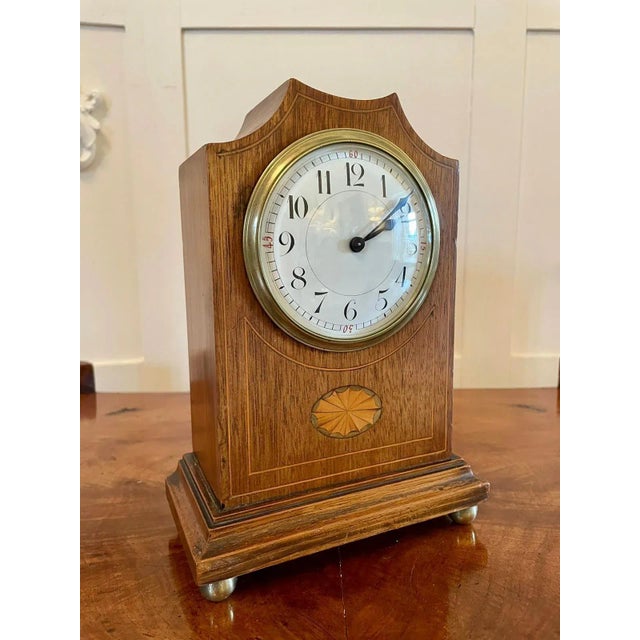 Antique Edwardian inlaid mahogany eight day mantel clock having a pretty shaped top mahogany case inlaid with boxwood...
