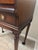 20th century reproduction cylinder desk with a curved, rotating wooden shutter that slides open to reveal an internal...