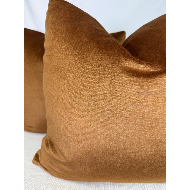 Custom pair of 22" pillows covered in a copper colored mohair. These pillows have tapered corners to prevent dog ears,...