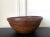 A large American turned wood bowl with impressive burl grains and original surface circa early to mid-19th century, likely...