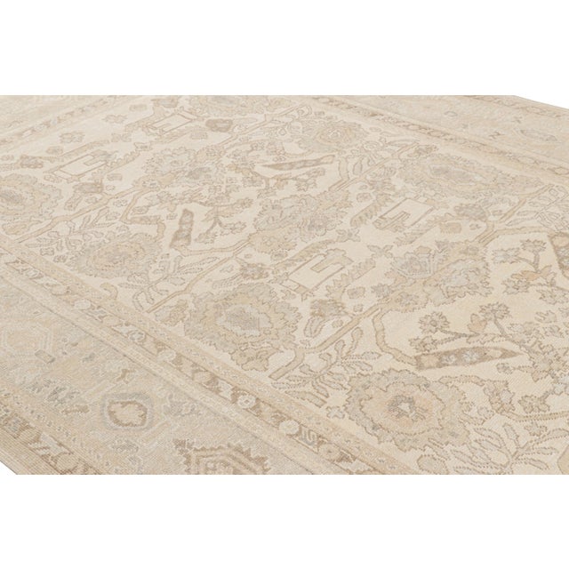 Hand-knotted in wool and silk, this 9x12 rug, originating from India, is from a new line of Rug & Kilim’s Modern Classics...