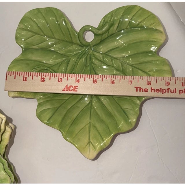 Bring timeless garden-inspired charm to your table with this beautiful vintage Fitz and Floyd Majolica cabbage leaf...