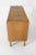 A handsome oak sideboard from Denmark, circa 1970s, executed in the style of Henning Kjærnulf. The piece carries the...