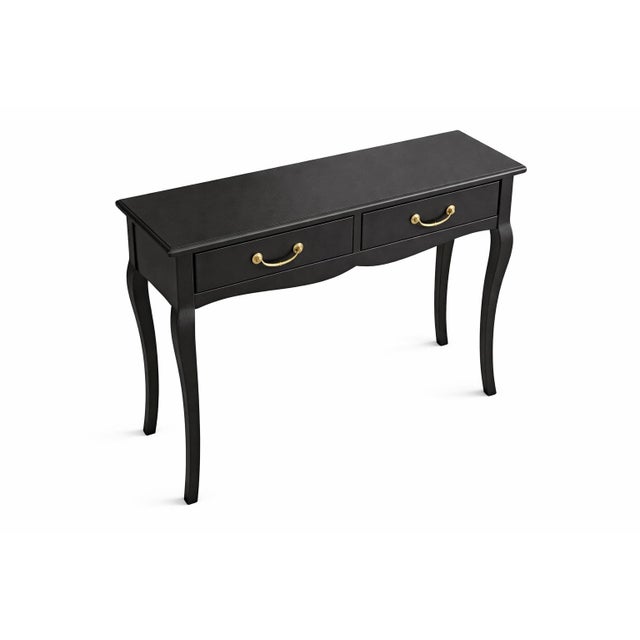 Elegant French Provincial writing desk or bedside table, refinished in a smooth matte black finish with updated sunlit...