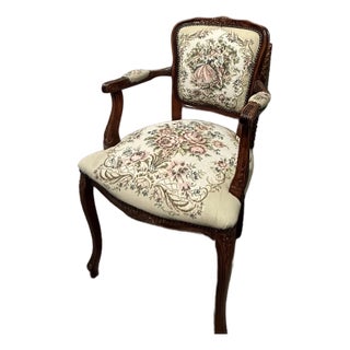 1950s French Louis XV Style Armchair Featuring a Carved Wood Frame and Needlepoint Tapestry Upholstery Depicting a Romantic Pastoral Scene For Sale
