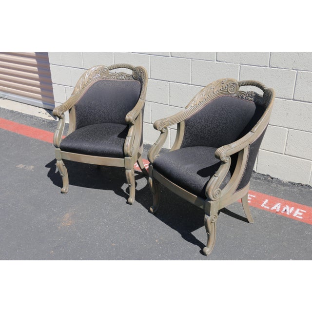 A beautiful pair of Italian-style armchairs from the 1990s, featuring elegantly carved wood frames with graceful scroll...