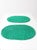 This pair of vintage crocheted placemats features a rich green hue and soft oval shape with a scalloped edge, crafted in a...