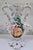 A striking mid-century Italian Capodimonte figural porcelain urn vase, finely detailed with a romantic hand-painted scene...