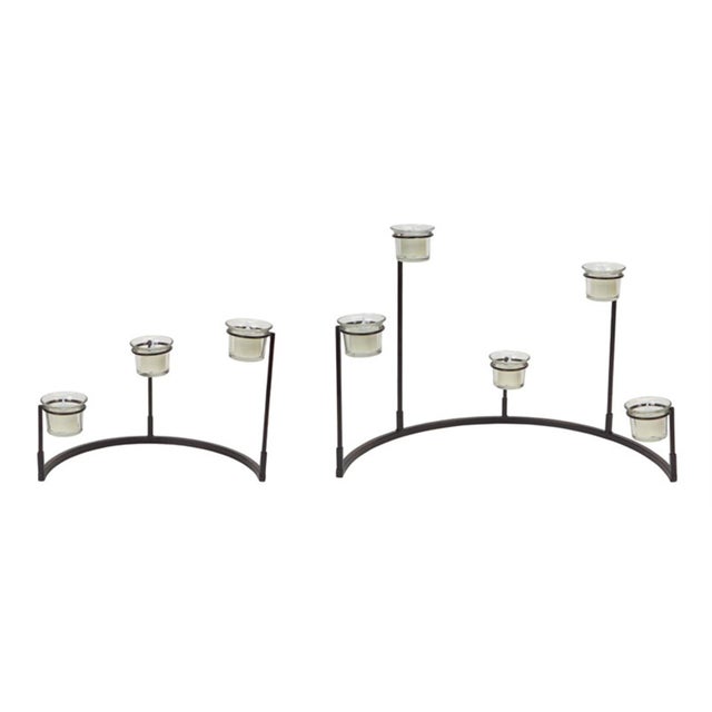 Enhance your home decor with this stunning set of Multi-Level Votive Candle Holder Stands. Crafted from durable black...