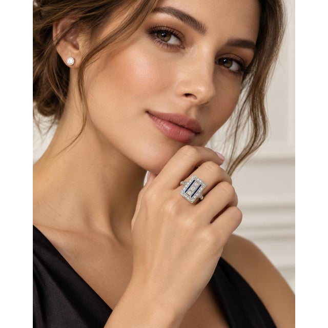 An authentic and geometric Art Deco statement ring masterfully crafted in solid, heavy platinum. Featuring a structured...
