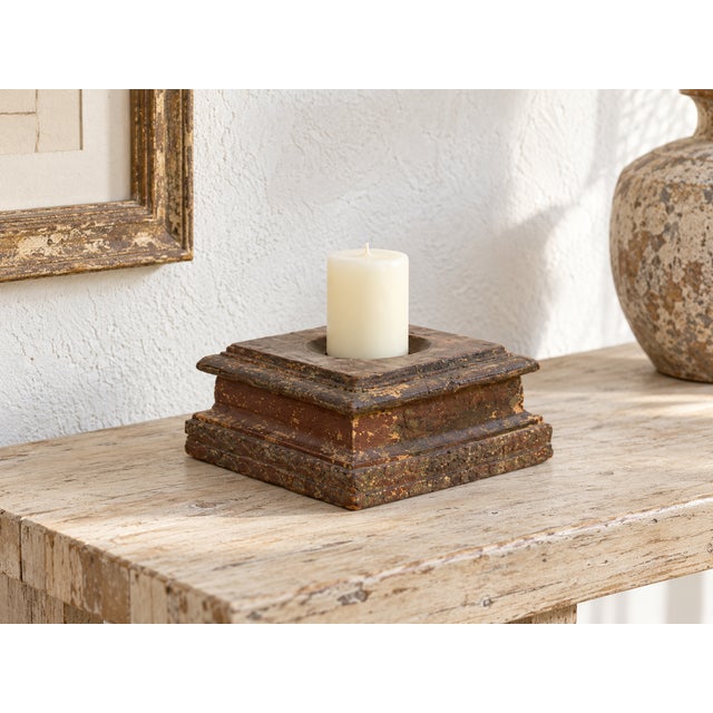 A spike at the center tells you what it was for. This antique teak plinth is built in low, stepped tiers, square at the...