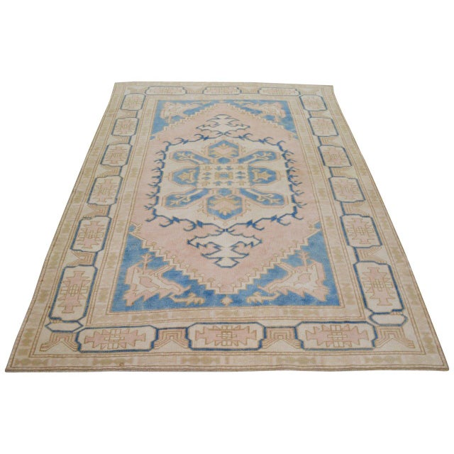 Hand-knotted with care using traditional rug-making techniques, this wool rug blends timeless craftsmanship with a modern...