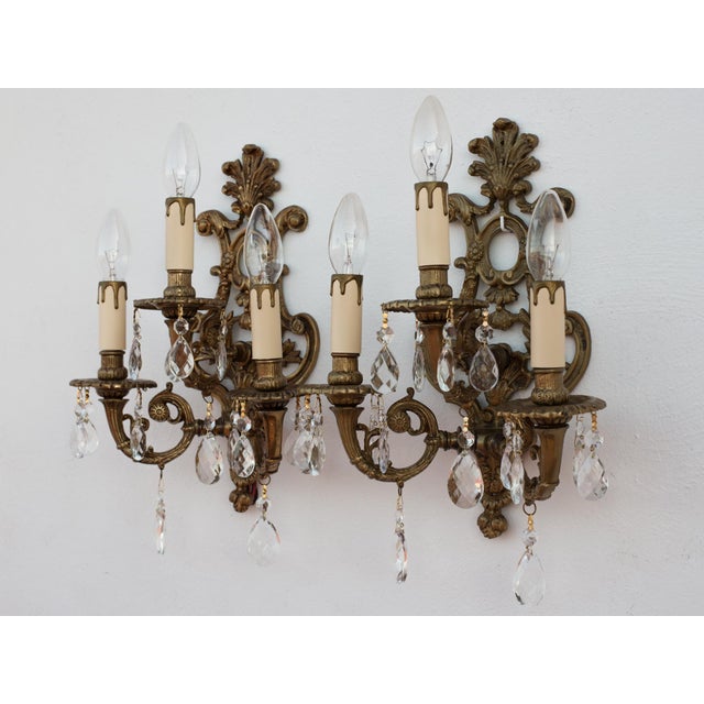 Spectacular and Exceptionally Heavy Matched Pair of 1950s Spanish Rococo Revival Style Solid Sand-Cast Brass 3-Light Wall...
