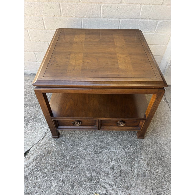 Hekman Walnut End Table with parquet patterned top and two lower drawers and brass hardware. Excellent condition. No...