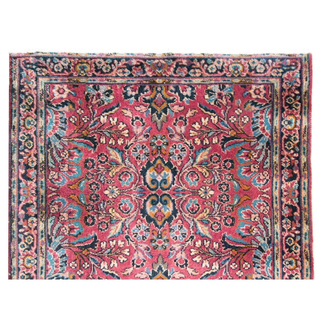 A wonderful early 20th century American Karistan runner woven with a traditional Sarouk-style pattern including repeated...