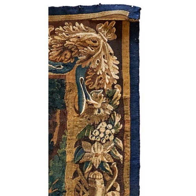 This beautiful French 18th Century Aubusson tapestry depicts an enchanting woodland scene with lush greenery and detailed...