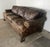 Vintage Distressed Leather Sofa With Lion Paw Feet For Sale - Image 11 of 16