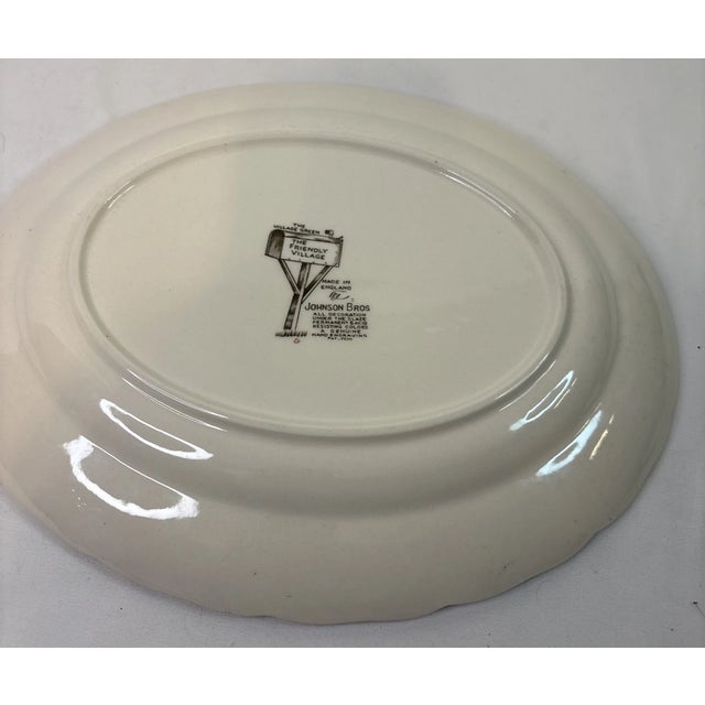 Bring timeless English countryside charm to your table with this vintage Johnson Brothers Friendly Village oval serving...