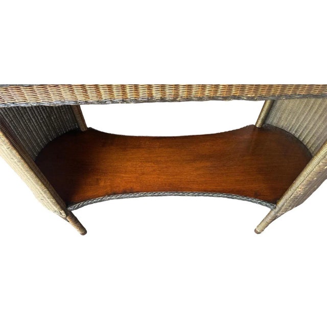 Antique 1920s Lloyd Loom Wicker and Cherry Wood Console Table made in Michigan by Lloyd Manufacturing Company. Early...