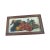 An appealing early 20th century fruit still life oil painting presented in its original wood frame. Grapes, peaches, and a...