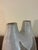 A sculptural mid-century American studio pottery double bud vase by noted ceramist Frances Simches. Hand-built with an...