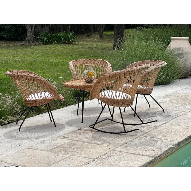 Vintage 1960s black wrought iron and rattan garden furniture set comprising: 1 round coffee table: Height 50 cm, Diameter...