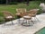 Vintage 1960s black wrought iron and rattan garden furniture set comprising: 1 round coffee table: Height 50 cm, Diameter...