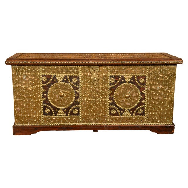 A very attractive antique 'Zanzibar' teak and brass stud work with copper overlay dowry chest, circa 1850. A fine quality...