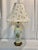 We'd love to share this beautiful vintage mid-century table lamp with you. There is no makers mark. However it embodies...